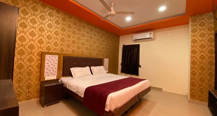 Hotel Nesam Grand by Mom & daughters hospitality Room Type - DELUXE AC