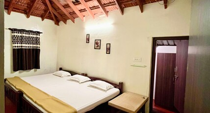 Hombaale stays Sakleshpur Room Type - Bedroom 1