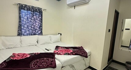 Hotel Maa Aashray Room Type - Deluxe double bedroom
