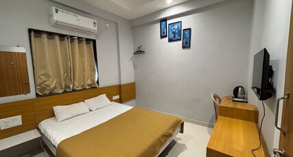 Vivanta Inn Lodge Room Type - Deluxe AC Room
