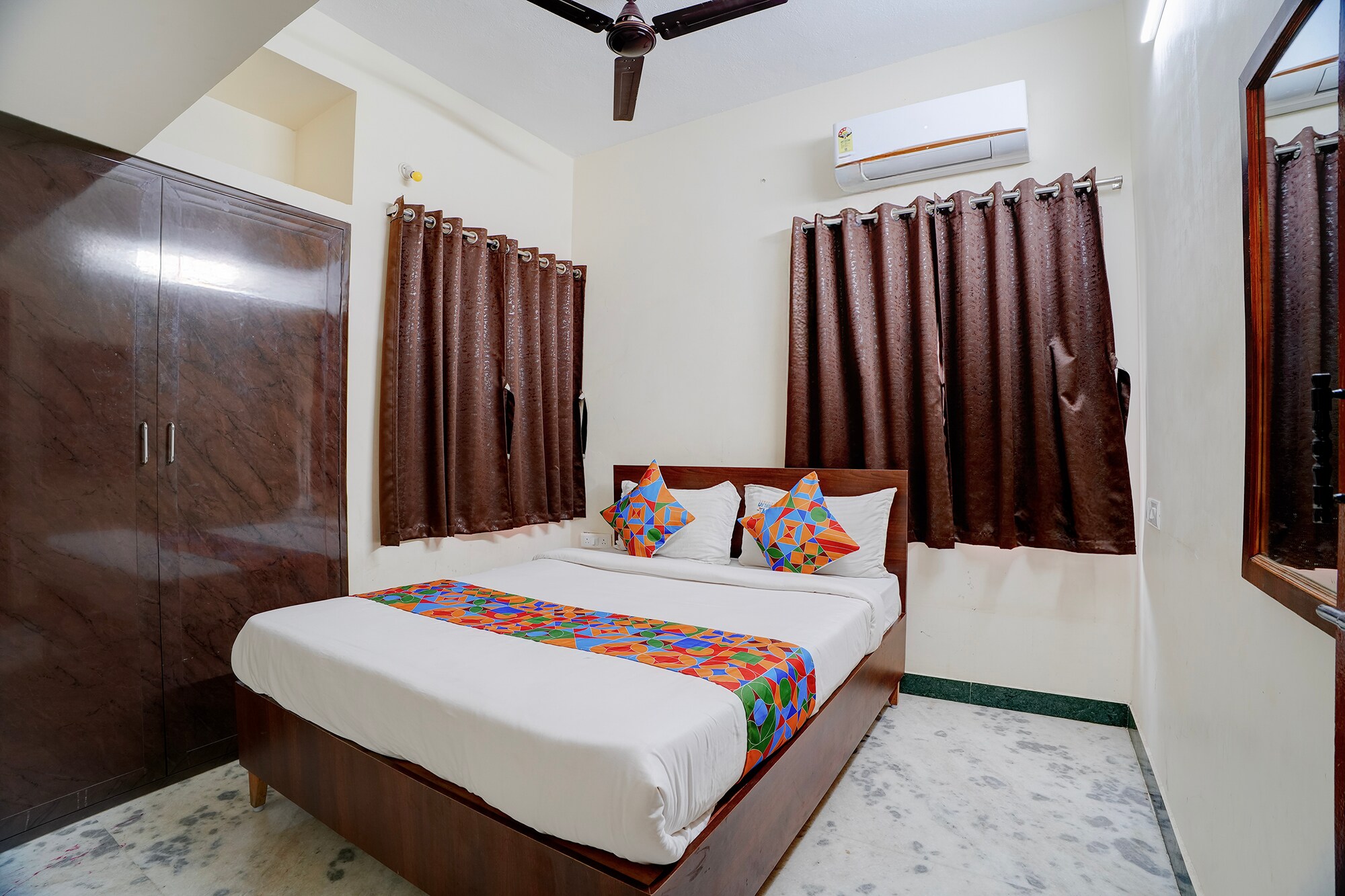 FabHotel Nimalan-Residency - Tap to explore photos