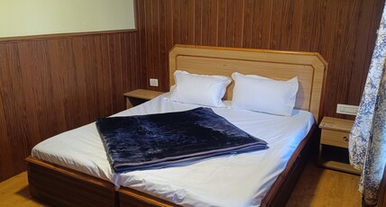 Ooty Travelers Lodge  Room Type - Bedroom 4