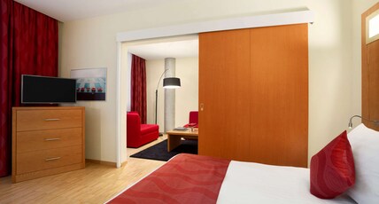 Ramada Encore by Wyndham Geneva Room Type - 1 King Bed Suite with Sofa Bed, Non-Smoking Ramada Encore by Wyndham Geneva Room Type - 1 King Bed Suite with Sofa Bed, Non-Smoking