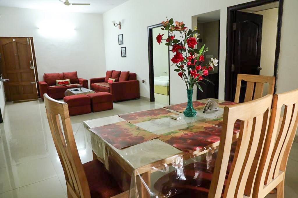 Pink Petals service Apartment by WB Hotels - Tap to explore photos