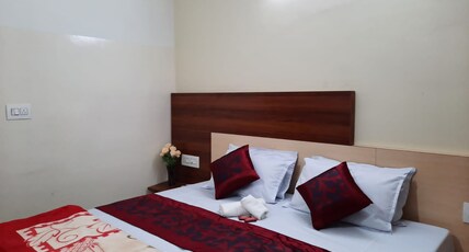 Ganesh Residency Room Type - Non AC Standard Queen Bedroom