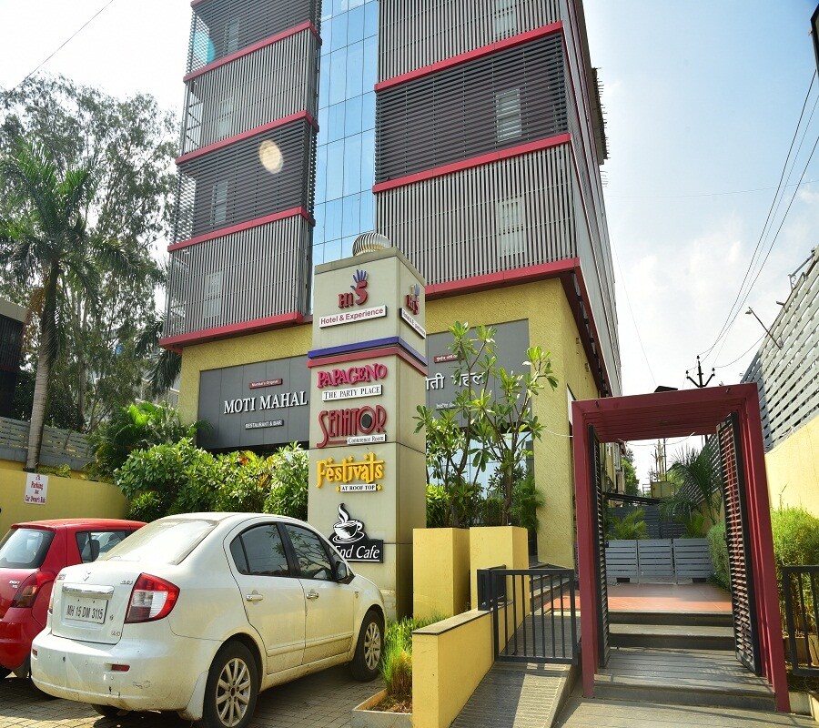 Hi 5 Hotel & Experience - Tap to explore photos