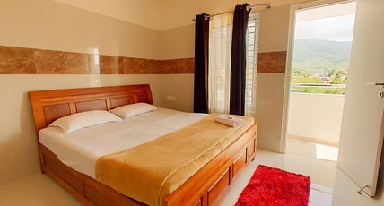 Kutralam Ezhilagam Hotel Room Type - Deluxe Studio Room with Balcony AC - MARUTHAM