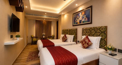 Staybook Hotel Nitya Maharani Room Type - Family Triple Room With Window Staybook Hotel Nitya Maharani Room Type - Family Triple Room With Window
