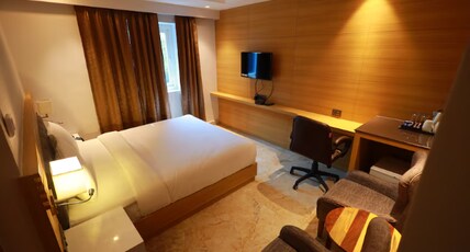Luxus Inn Hotel Room Type - Deluxe Room