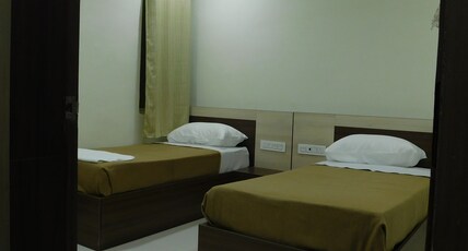 Shree Hotel Room Type - Deluxe AC