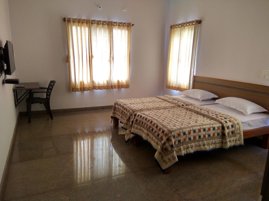 Aashraya Homestay | Rooms & Caretaker - Tap to explore photos