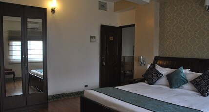 Orchid Suites Room Type - Deluxe King Room