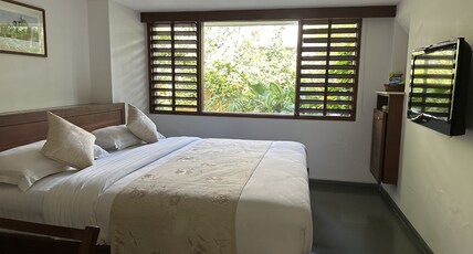 Uteliaa Homestay Room Type - DELUXE ROOM