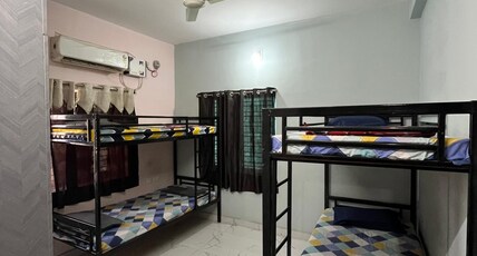 The Human Nest Co Living | 6Mins From ITER College Room Type - A Bunk Bed in 4- Bunk Bed AC Male Dormitory Room