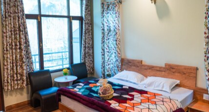 HIM TAJ HOTEL Room Type - Deluxe Room
