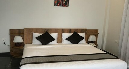 RANKK Stays Room Type - Deluxe Room