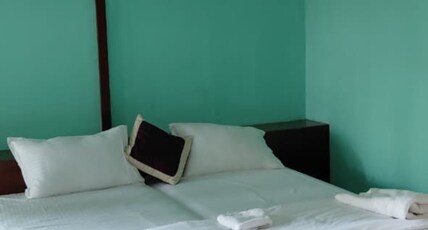 TOP IN TOWN HIGHWAY RESTAURANT AND HOTELS Room Type - Deluxe AC