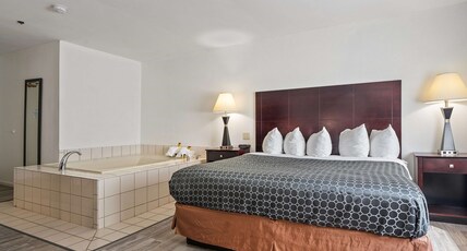 Best Western Plus Oakbrook Inn Room Type - Suite-1 King Bed, Non-Smoking, Jetted Tub, Heavenly Bed With Feather Pillows, Goose Down Comforter, Best Western Plus Oakbrook Inn Room Type - Suite-1 King Bed, Non-Smoking, Jetted Tub, Heavenly Bed With Feather Pillows, Goose Down Comforter,