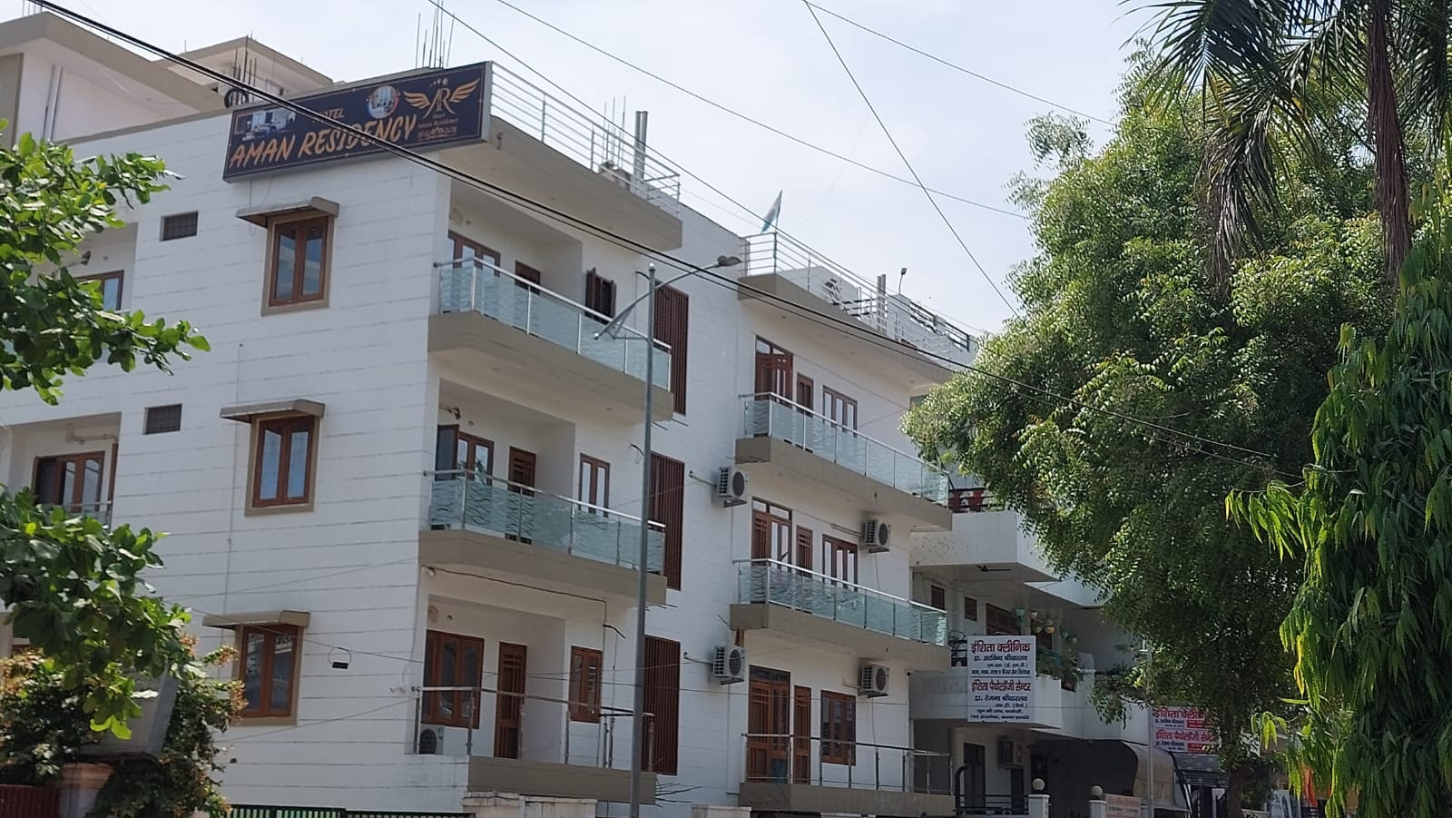 Hotel Aman Residency - Tap to explore photos
