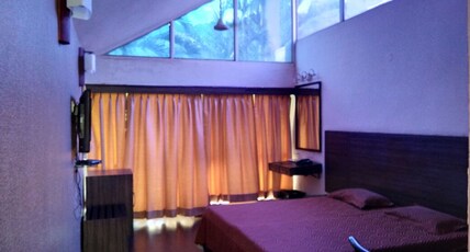 10th Milestone Resort Room Type - Deluxe AC Room