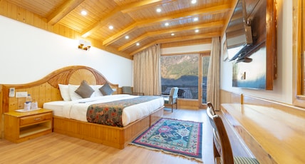 Snow Peak Retreat & Cottages (Centrally Heated- Hill View) Room Type - Luxury Room - Air Conditioned-Centrally Heated | Balcony Snow Peak Retreat & Cottages (Centrally Heated- Hill View) Room Type - Luxury Room - Air Conditioned-Centrally Heated | Balcony