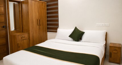 PopTavern Nakshatra Apartments Thiruvananthapuram Room Type - Deluxe Room