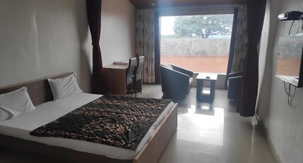 Natraj Holiday Resort Bhimashankar by Prospera Hospitality Pvt. Ltd. Room Type - Super Deluxe Room Natraj Holiday Resort Bhimashankar by Prospera Hospitality Pvt. Ltd. Room Type - Super Deluxe Room