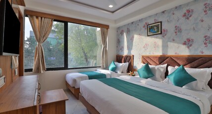 Hotel Vimal Inn Room Type - Deluxe Triple Room