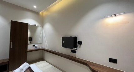 Hotel Purnima Regency Dhule Room Type - Deluxe Room AC Hotel Purnima Regency Dhule Room Type - Deluxe Room AC