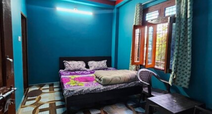 Riyanshi Homestay Room Type - Deluxe Room