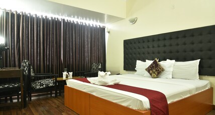 Hotel Rajhans International  Room Type - AC Executive Deluxe Room