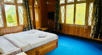 Cliff View Residency Room Type - Suite Room with Mountain Cliff and Waterfall View