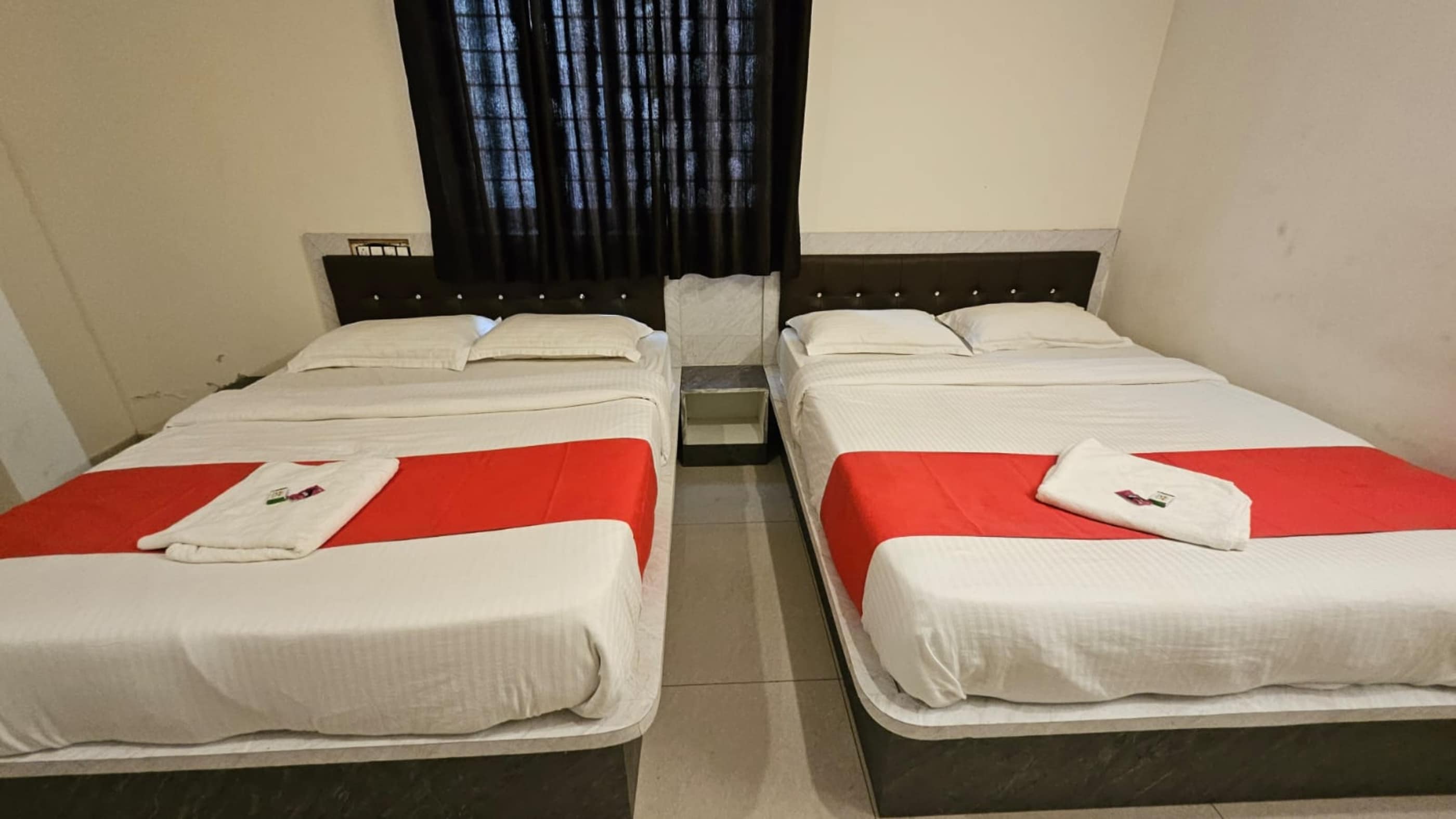 Hotel Raj Comfort - Tap to explore photos