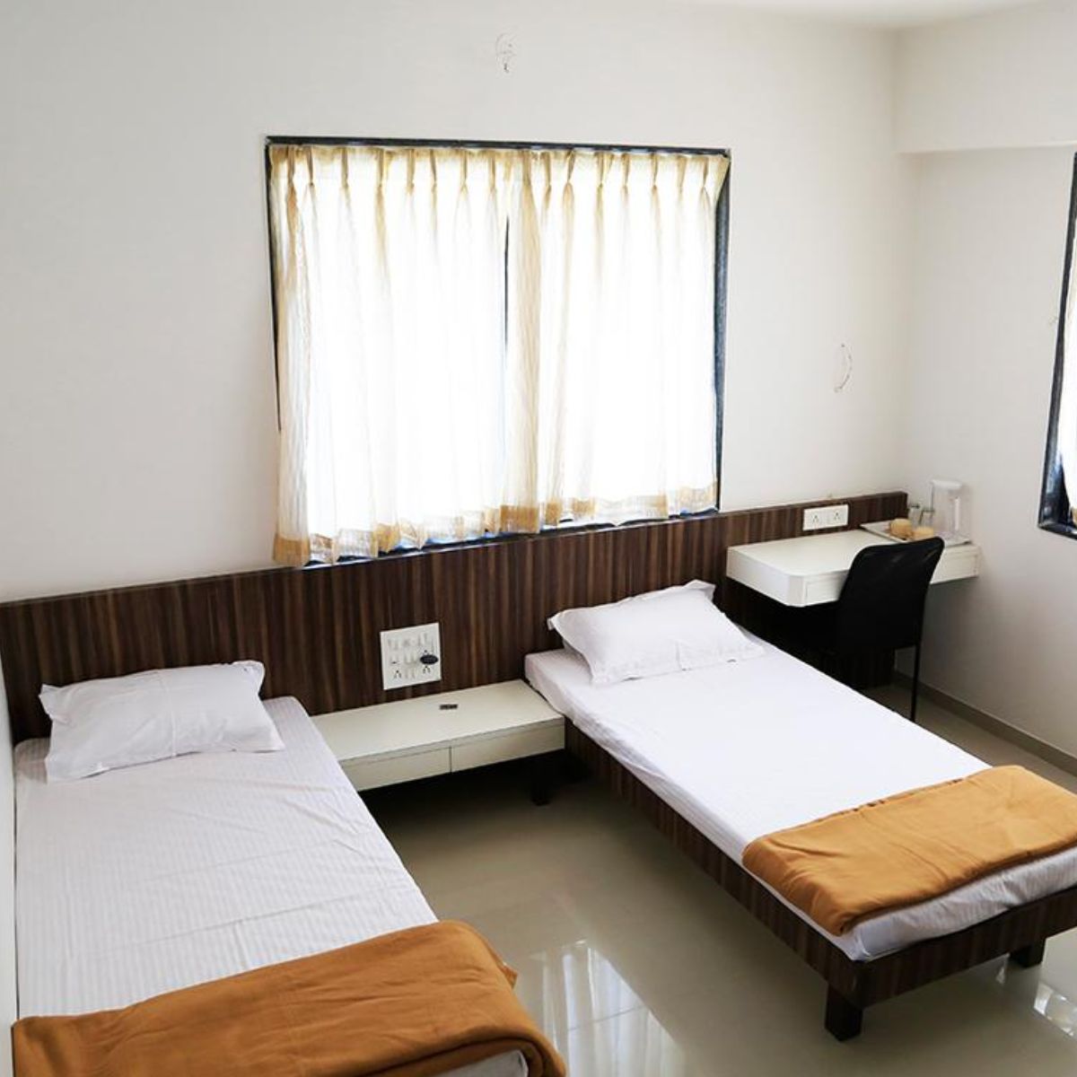 Aashiyana | Rooms in a Service Apartment - Tap to explore photos