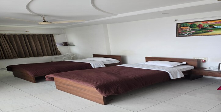 Vapi-Thermax Guest House - Tap to explore photos