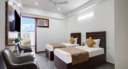 Asian suites By IAH Room Type - Deluxe Room with Attached Bathroom