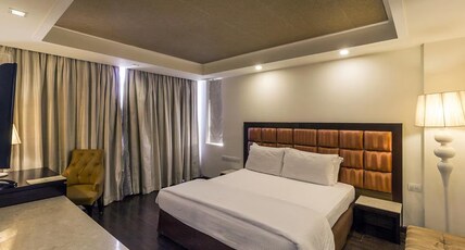 Madhuban Hotel Greater Kailash Room Type - Deluxe Room.