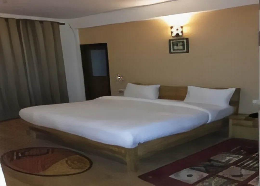 Malik Guest House By WB Inn - Tap to explore photos
