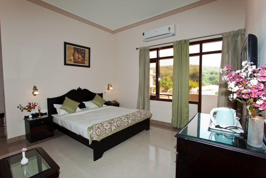 Araliayas Nature Resort, Lake Pichola Road  Pool & Restaurant - Tap to explore photos