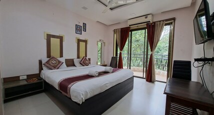 Hotel Laxmi Residency Room Type - AC Super Deluxe Room With Balcony