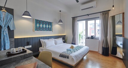 Poshtel VNS | A Boutique Stay Room Type - Queen Room with Balcony