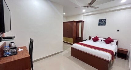 Royal Flora Koramangala Room Type - Deluxe Room