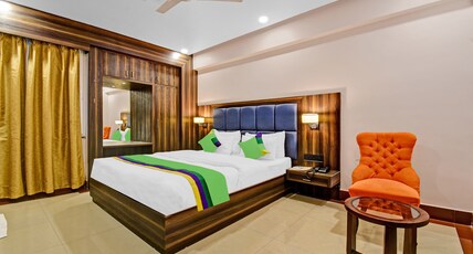 Treebo The Pearl Bliss Room Type - Deluxe Room