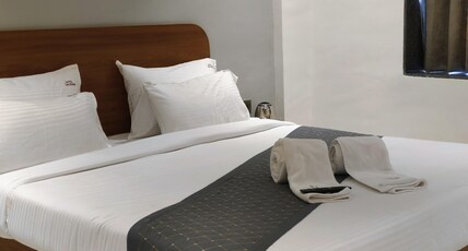 HOTEL SAIRAM VEG RESTAURANT AND LODGING Room Type - Deluxe Queen Bed