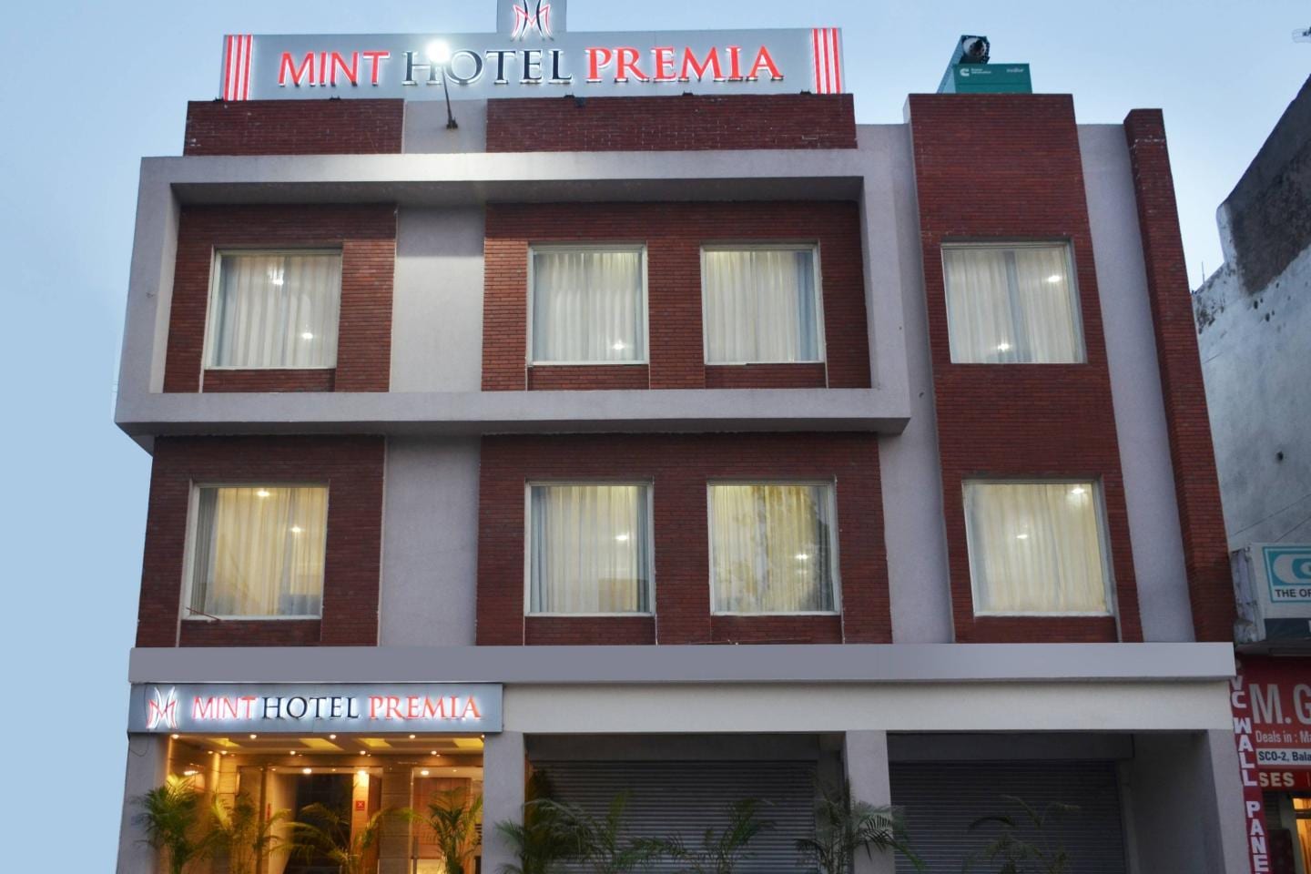 Mint Hotel Premia - Tap to explore photos