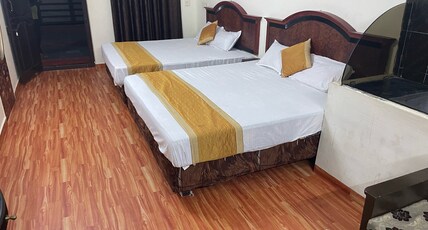 SMJ GRAND HOTEL - MELMARUVATHUR Room Type - Executive AC Triple Room