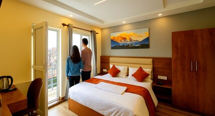 Kathmandu Royal Chamber Hotel Pvt. Ltd. Room Type - Deluxe King/Couple Room with Private Balcony and City & Mountain View [10% discount in Restaurant]