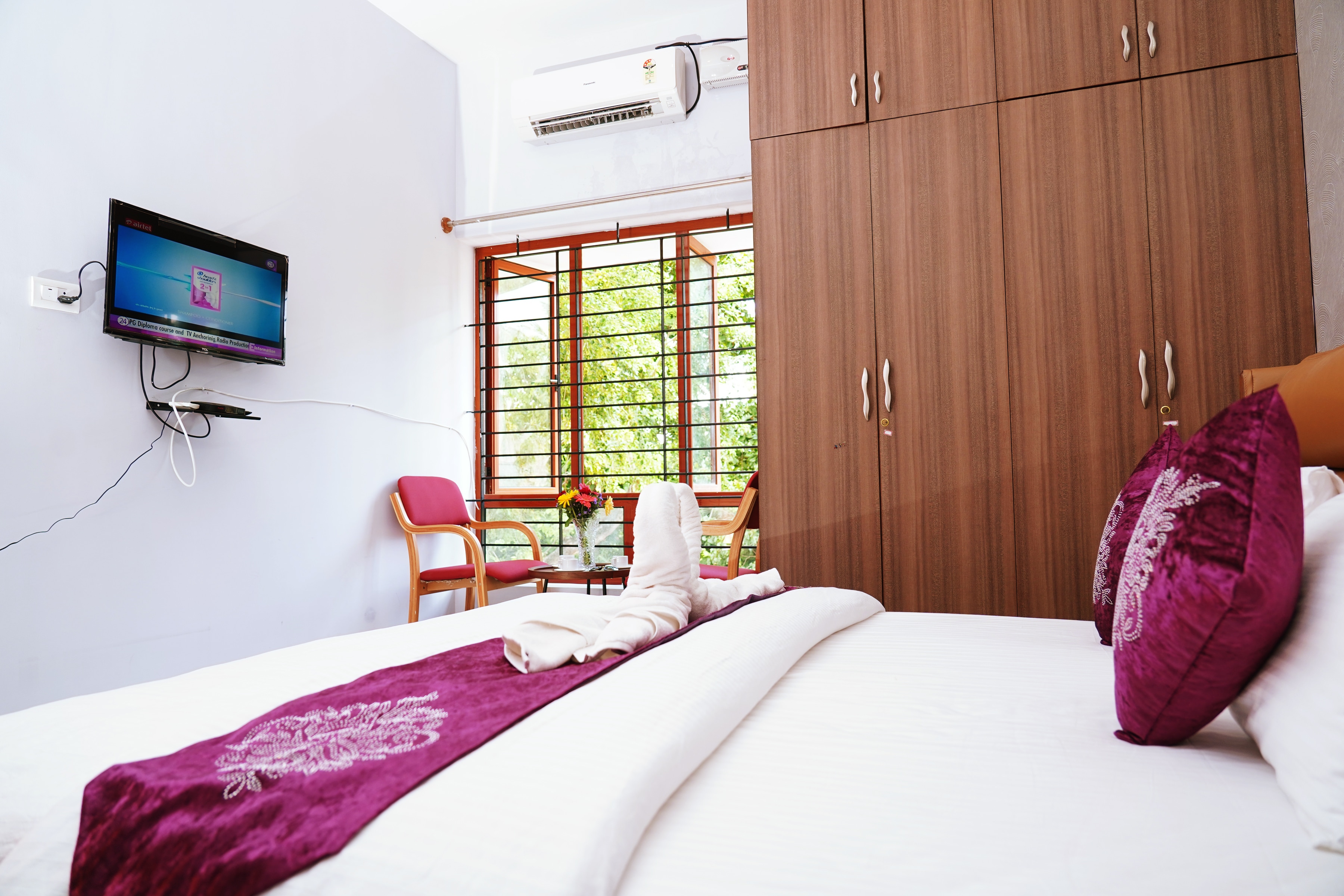 Unnathi Suites - Tap to explore photos