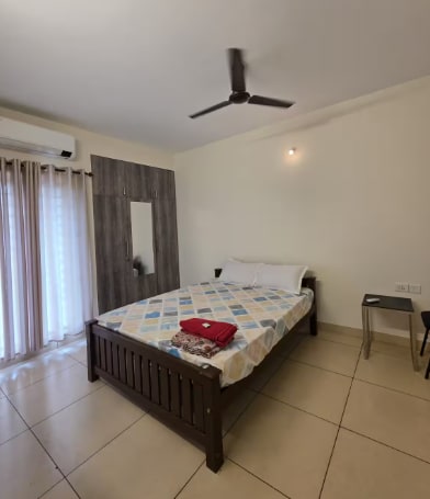 Amala Heights 1BHK Staycation - Tap to explore photos