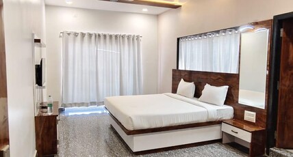 Enjoy World Resort Room Type - Deluxe Double Bedroom AC